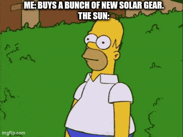 A gif of Homer Simpson receding into the bushes to disappear.  Caption reads "Me: Buys a bunch of new solar gear.  The sun: [Homer receding into bushes]"