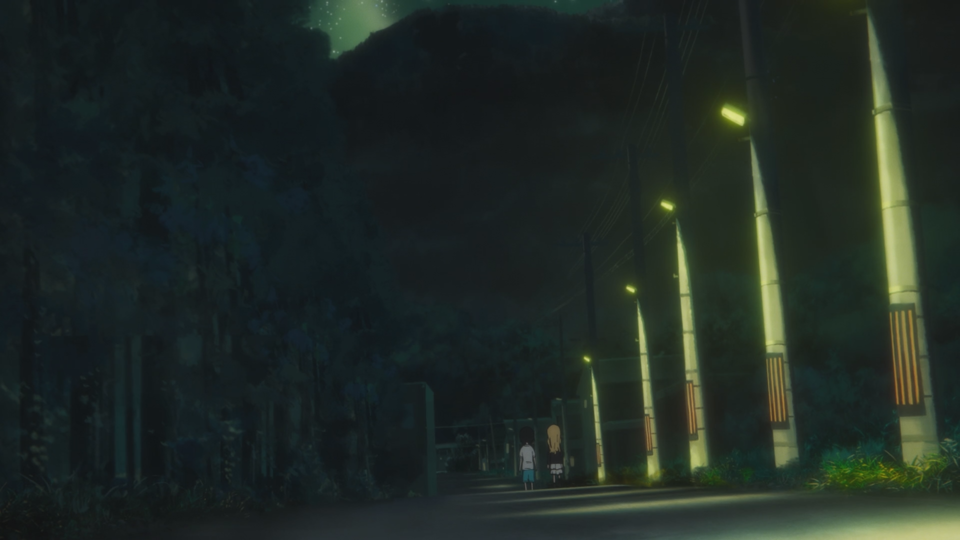 A screencap from the anime Takopi's Original Sin, showing two girls walking side by side, a blonde and a brunette, their backs turned to the viewers as they walk away into the night, a dark forest in one half of the screen and a series of lamp posts on the other half 