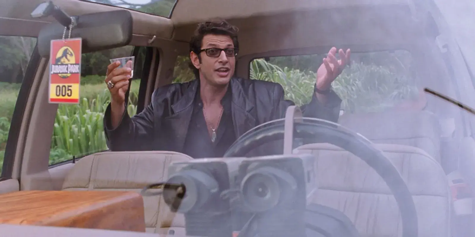 Ian Malcolm played by Jeff Goldblum shrugging in Jurassic Park, referenced for the 'life finds a way' quote but there's so many goofy stills to pick from