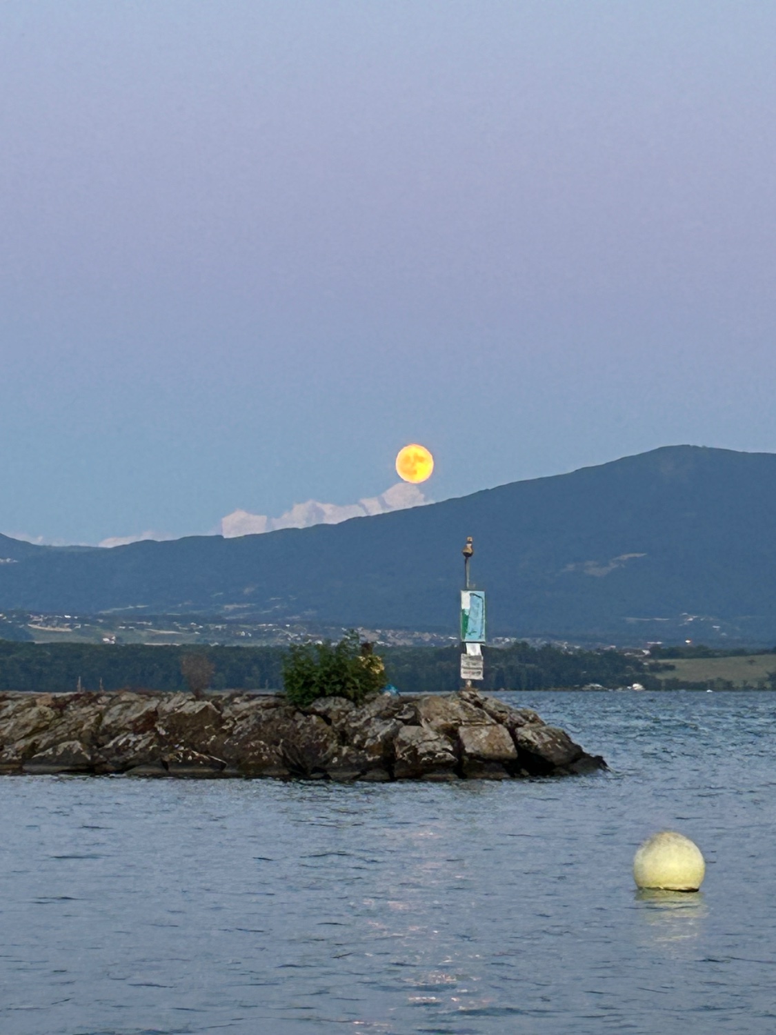 The moon balancing on the mountain. 