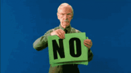Man holding green posters that say “NO” in giant black letters, throwing one poster to the ground and showing the same poster behind it in a repeated loop.