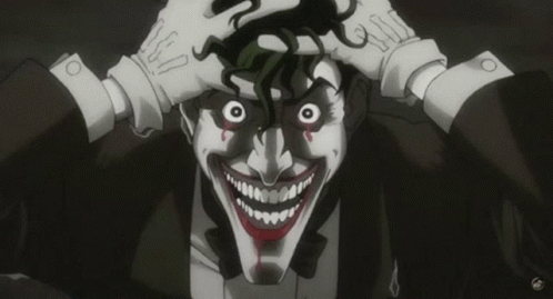 dc comics joker holding his head with crazed open eyes look and laughing animated GIF