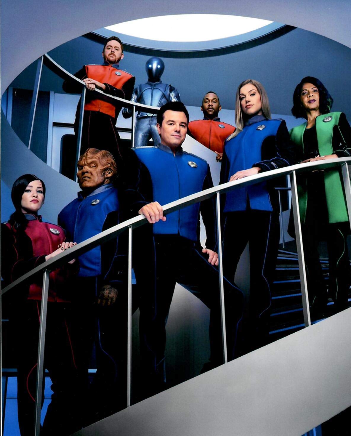 Season 3 cast photo from The Orville, posing on the ship’s circular stairs.