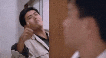 gif of Chow Yun-fat in I think John Woo's Hard Boiled chewing and giving a thumbs up. I'm not sure because I remember liking the movie years ago but a lot of action from that era hasn't aged well. I'm pretty sure there was some heavy cop propaganda.