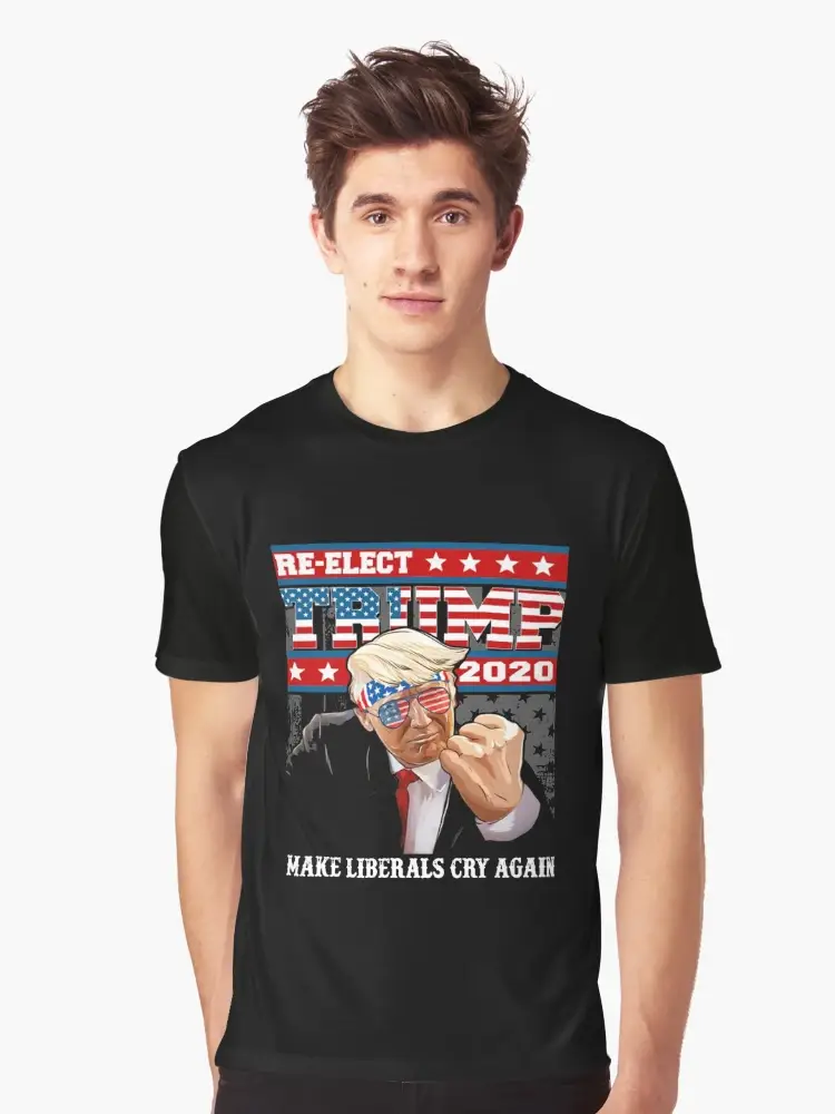 A guy wearing a black "Trump 2020: Make Liberals Cry Again" shirt